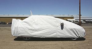 Car Covers?-evo-under-cover-rightside-net.jpg