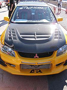 Evo's at the 2010 SEMA Show in Vegas-yellow-evo-front-birds-eye-resize.jpg