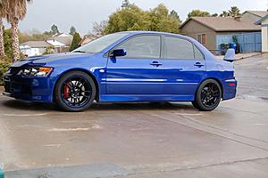 electric blue w/ electric blue lip rims-evo-black-blue-rim.jpg