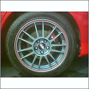 Vinyl red tape on wheel lip-aros.jpg