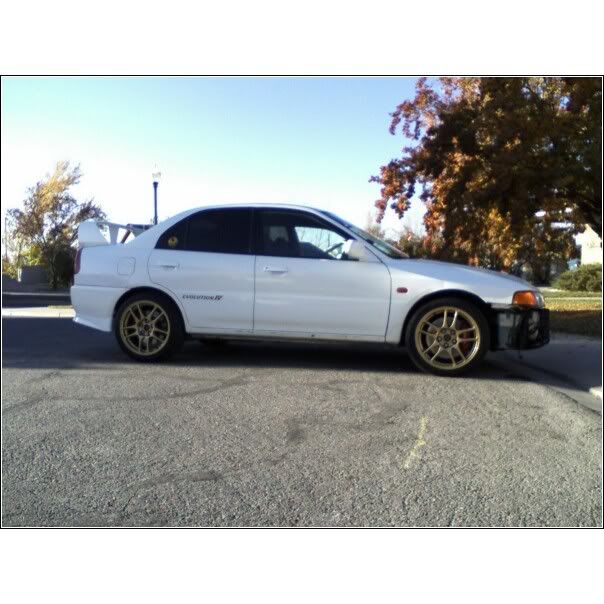 Name:  EvoIVwithgoldwheels-2.jpg
Views: 0
Size:  64.8 KB