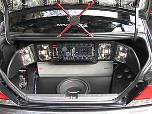 Show your stereo installs, has anyone put a sub in the spare tire w/ a custom box?-mitsubishi-lancer-297_evom.jpg