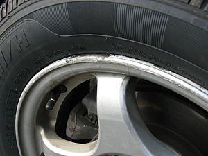 Rust blisters on rims? Help with complaint.-rims_bad_2.jpg