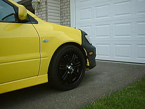 Who has black rims on a yellow lancer?-1.jpg