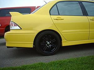 Who has black rims on a yellow lancer?-2.jpg