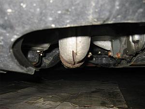 A major hole in a metal pipe under my car...problem?-pic-1.jpg