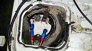 One Lap of America 2012 Rochester Group-evo-x-fuel-pump-assembly-location.jpg