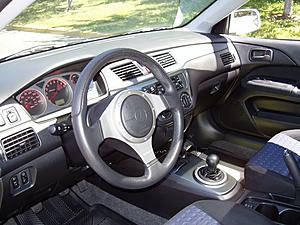 03 White Evo FS With Pics!!-interior.jpg