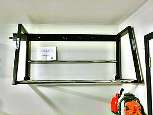 Wall mounted tire storage rack in ct-c360_2011-10-1119-35-04_19.jpg