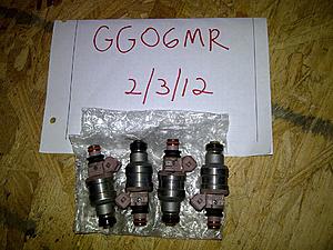 Stock IX coils and wires, ported and coated stock exhaust manifold, and IX injectors-stock-evo-ix-injectors.jpg